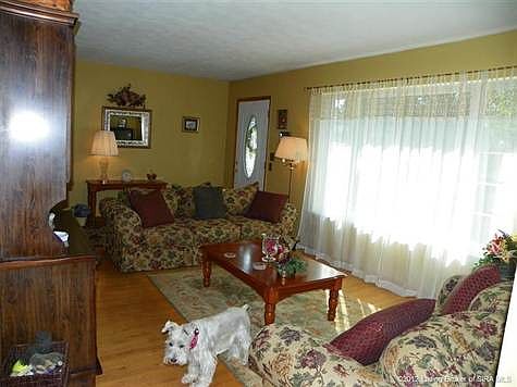 Large windows in living room offer plenty of natural light.