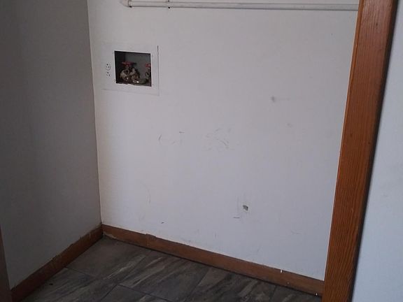 This unit does have space for full size washer and dryer off the kitchen