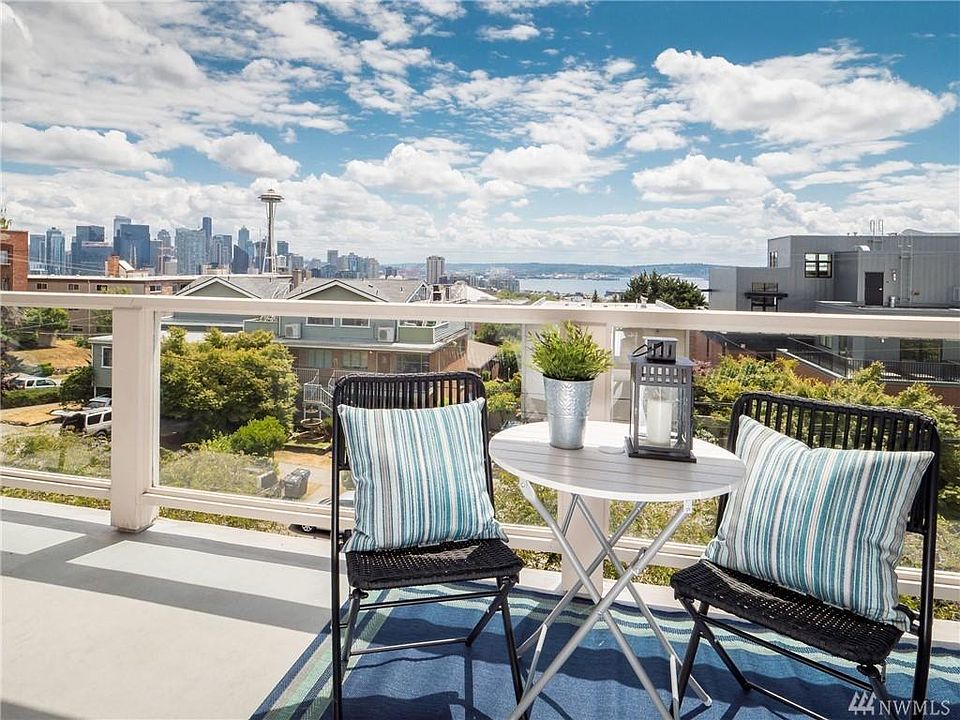 Your large deck with city, rainier and ocean views!