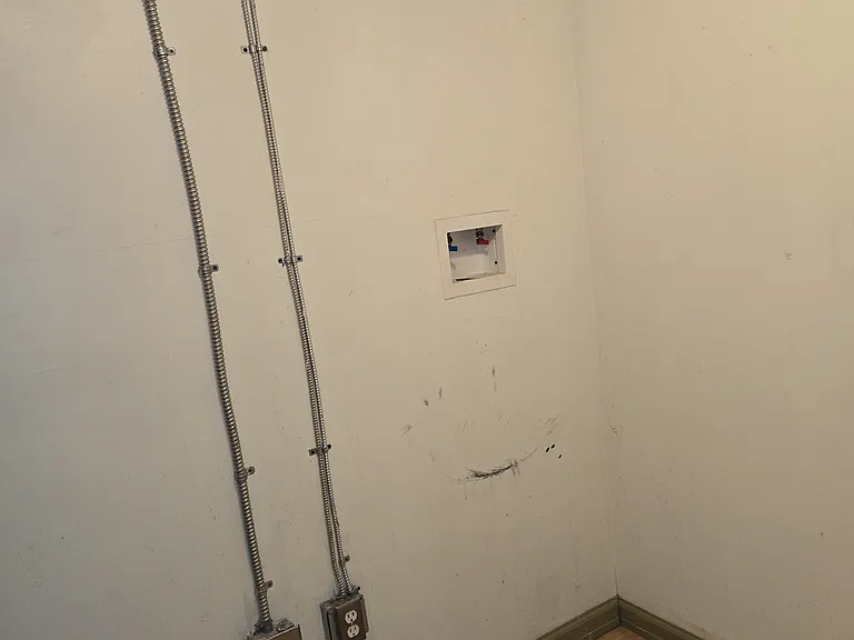 Washer and Dryer Connections in Laundry Room