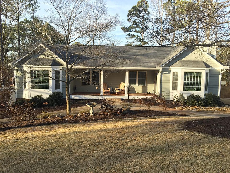 Circular drive - one step to front door - covered porch with ceiling fans!