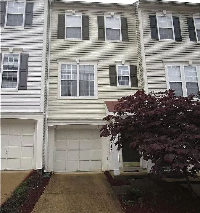 Entrance with 1-car Garage