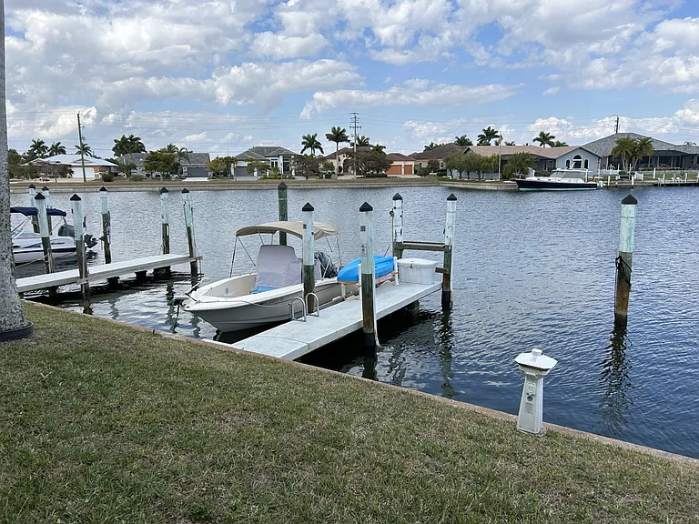 waterfront Condo with deep water boat slip, for sail or power boats. No bridges in the way.