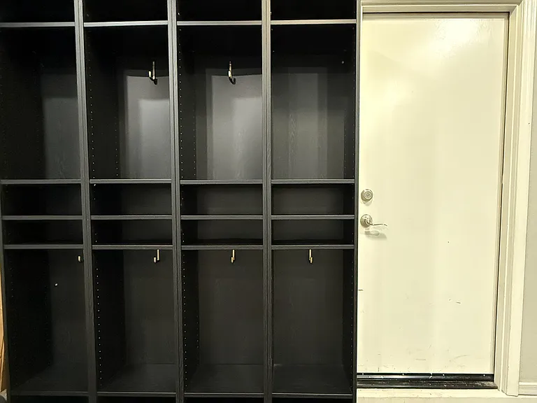 Custom built-in mudroom style cubbies keeps everyday essentials organized.