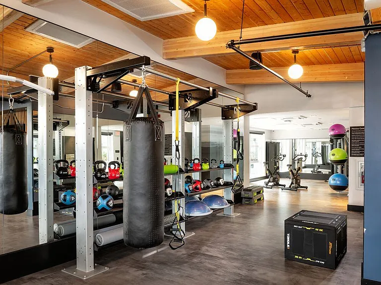 Fitness center with free weights, exercise bikes, and fitness studio