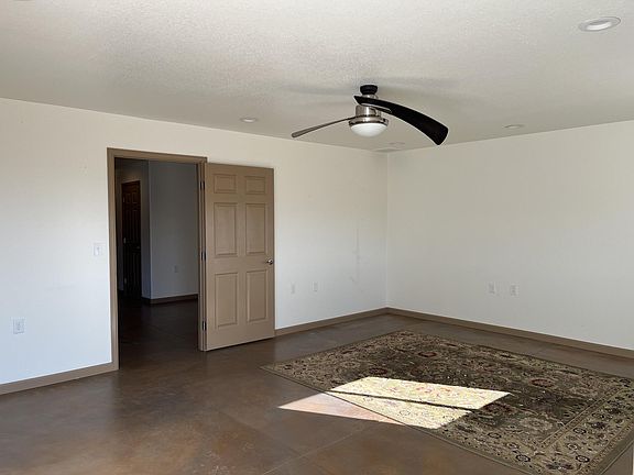 Living room, entry to kitchen and office nook