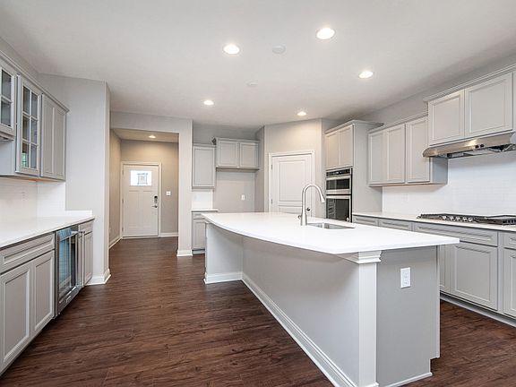 Spacious kitchen with beverage center