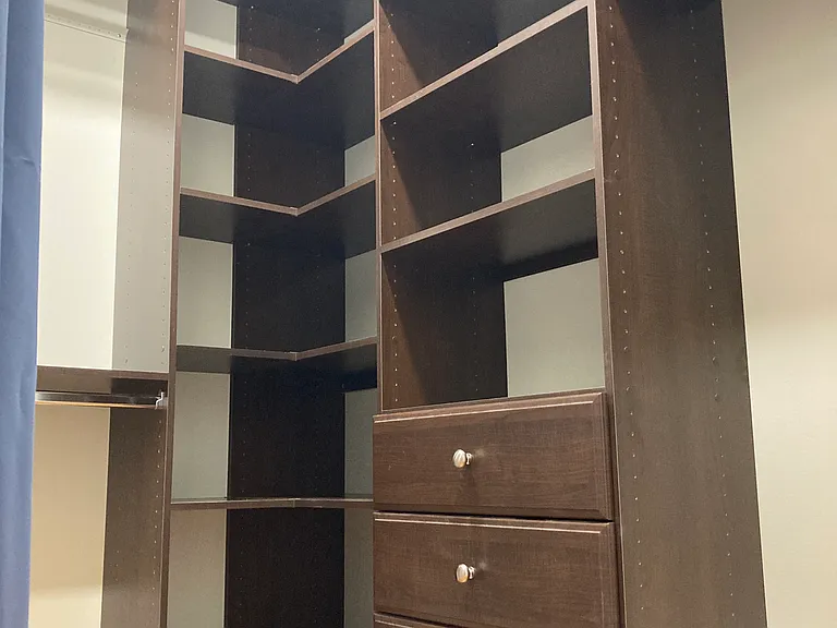 Walk in closet in the master bedroom.