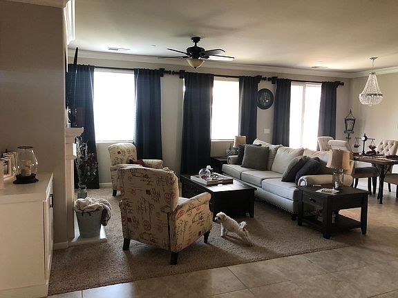 Open floor plan. Crown molding throughout.