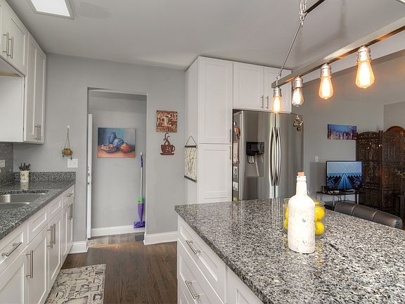 Gorgeous Pendant Lighting and Pantry Cabinet