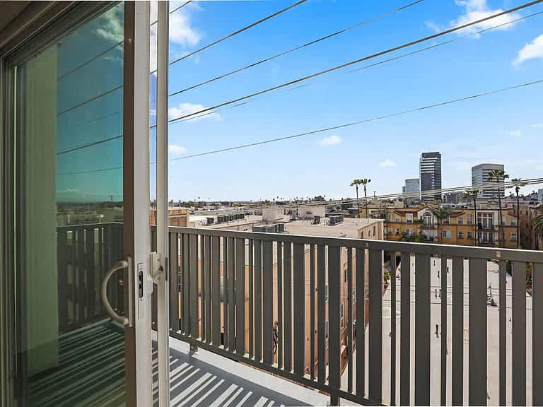 Upper Level Unit with a Patio with Views of the City