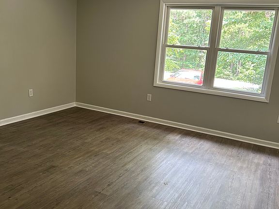 bedroom with luxury vinyl floors