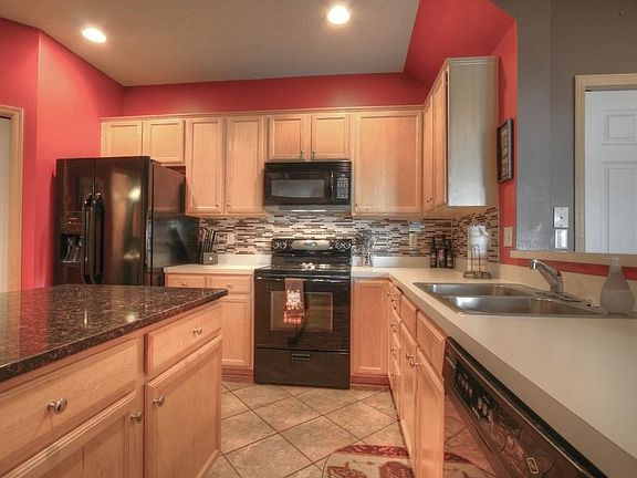 Beautifully updated kitchen w/ newer countertops and appliances.