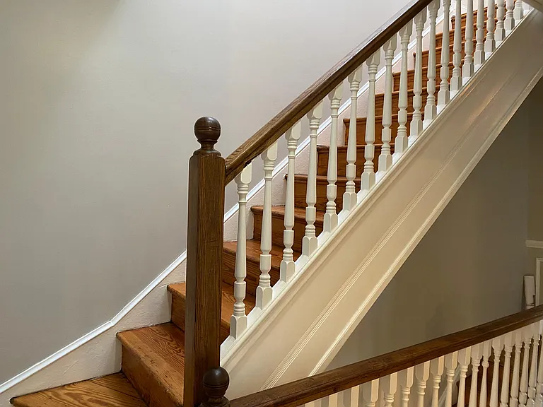 Stairs up to 3rd Fl with master suite and guest bedroom with full bath.
