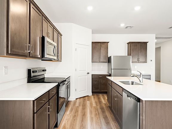Each kitchen comes with stainless steel appliances included.