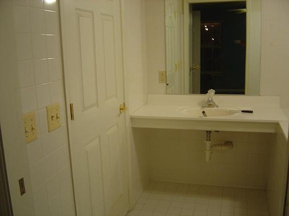 Side A of the master bath! This bathroom also has a ceiling fan!