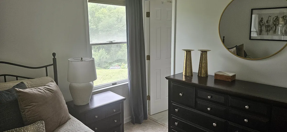 View inside bedroom, toward bathroom entrance - Brown Rd