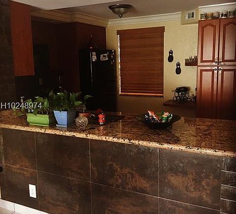 5th image of 311 SE 3rd St APT 205