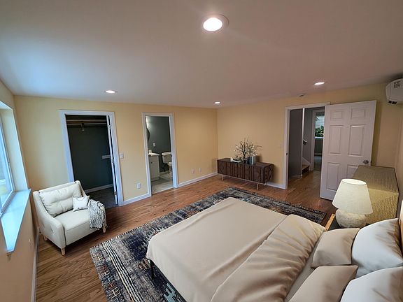 Master bedroom with walk-in closet and full bath