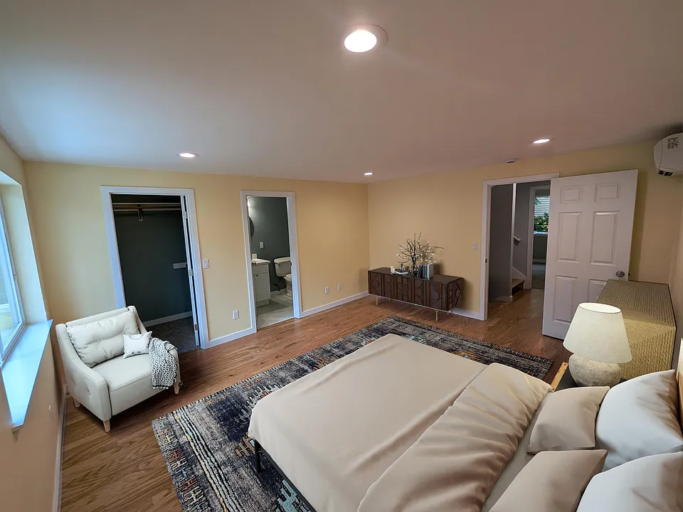 Master bedroom with walk-in closet and full bath