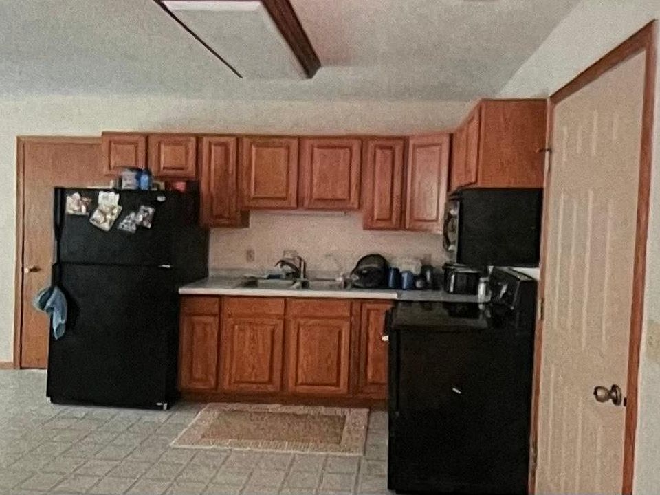 Kitchen with the door going to garage