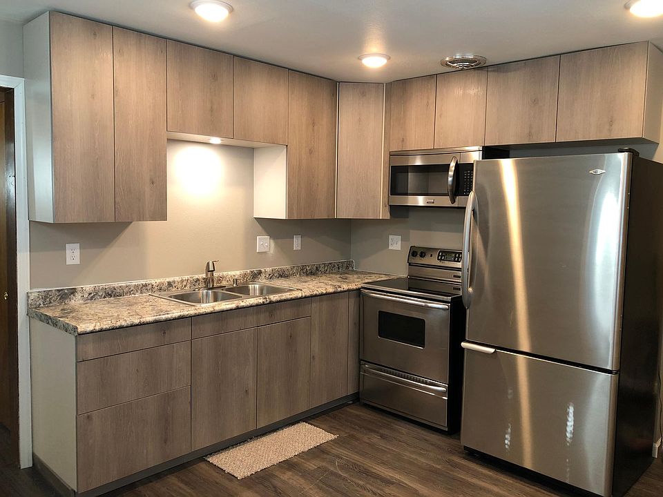 All new kitchen cabinets, flooring, and appliances.