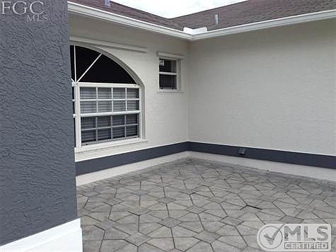Silver pavers define additional entertaining/relaxing areas as well as minimizing yard maintenance needs