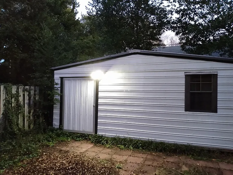 Storage/gardening shed with lighting and electric.