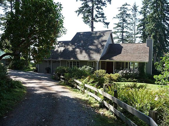 Lovely Cape Cod Style Home on 2.4 Park-Like WFT Acres