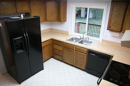 kitchen with new refrigerator