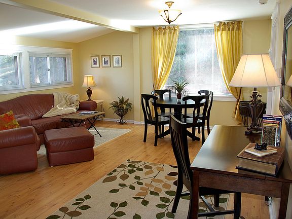 Dining & living area create a cozy atmosphere.