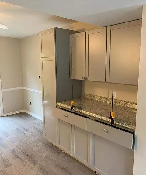 New kitchen with lots of storage and new life proof plank flooring thruout the house.