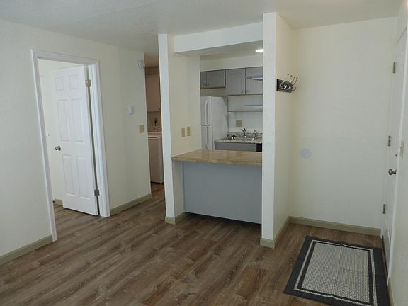 Newer kitchen cabinets and laminate floors throughout home, with fresh paint throughout.