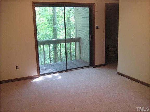 master bedroom with balcony