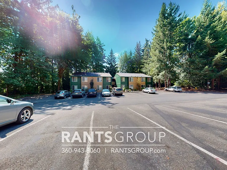 Lovely, wooded 2-bedroom apartment with a large private deck and in-unit washer & dryer! — Photo 51