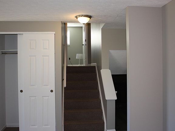 Coat Closet near front door. Stairs leading up to 3 Bedrooms including Master Bedroom and Bath along with Full Bathroom off of the Hallway.