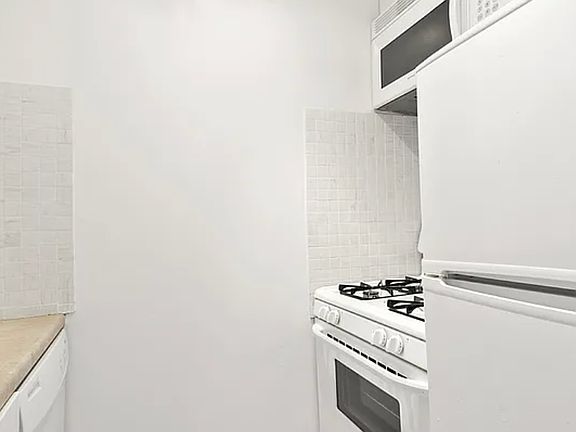 5th image of 393 W 49th St APT 4M