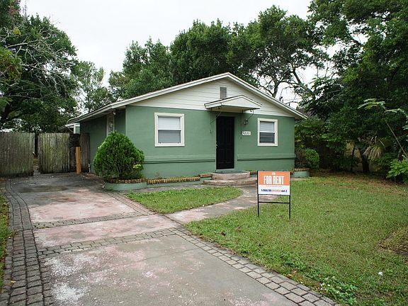 Front w/ Sign