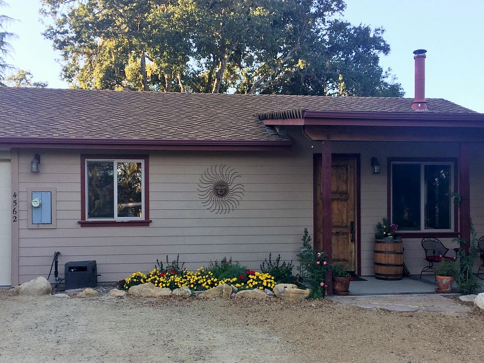 This is the front of our cottage that includes a one car garage with garage opener and extra space for storage.