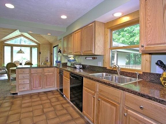 Kitchen with new counters, sink and cabinets