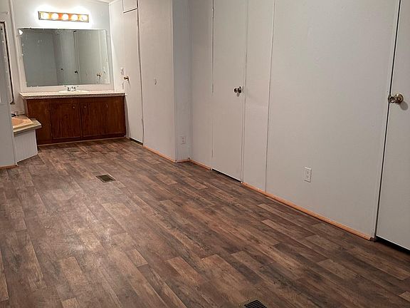 Master Bedroom with 2 closets, tub, and vanity, 2nd bathroom with shower.