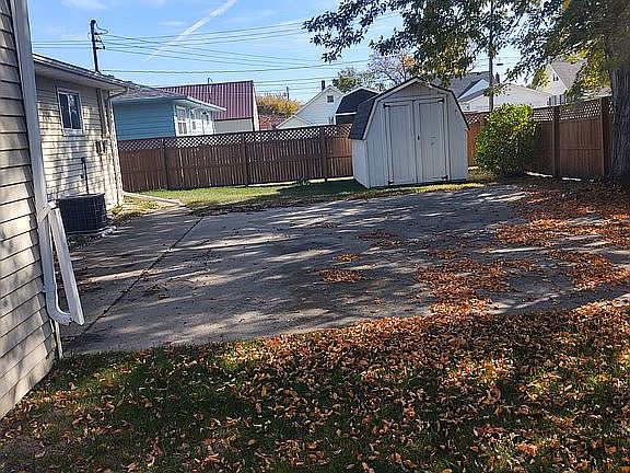 Back yard with storage shed