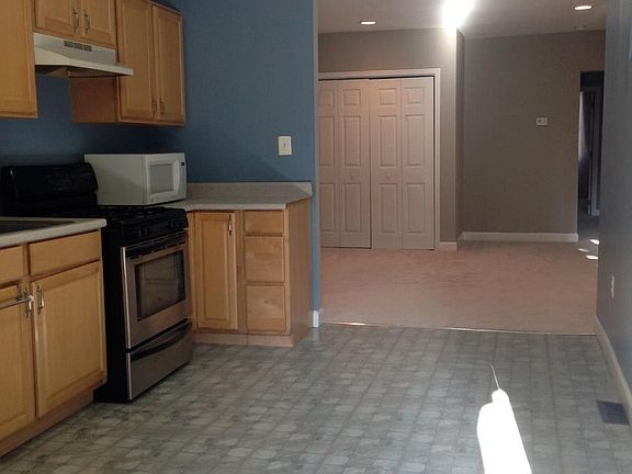 Kitchen leading into living room