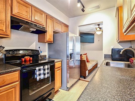 Galley style kitchen, looking into the living room