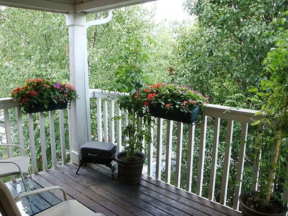 Inviting private balcony nestled in the trees