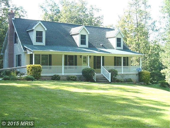 Cape Cod, Wooded lot, Dormers and Front porch