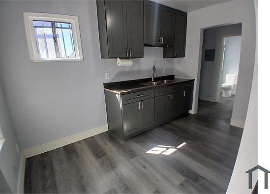 1st image of 8641 1/2 S Hoover St #11