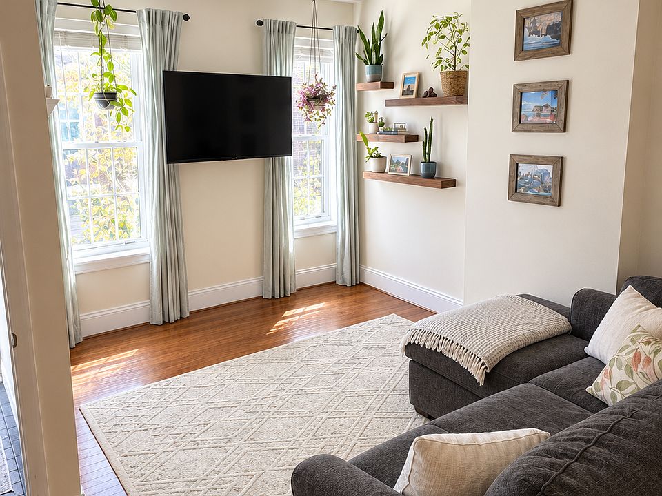 Cozy living room with plenty of natural light.