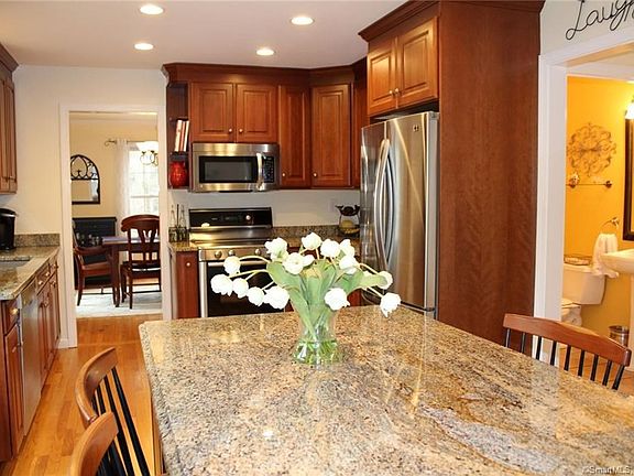 Gorgeous granite counters in this custom kitchen by Gedney Kitchens in Madison!