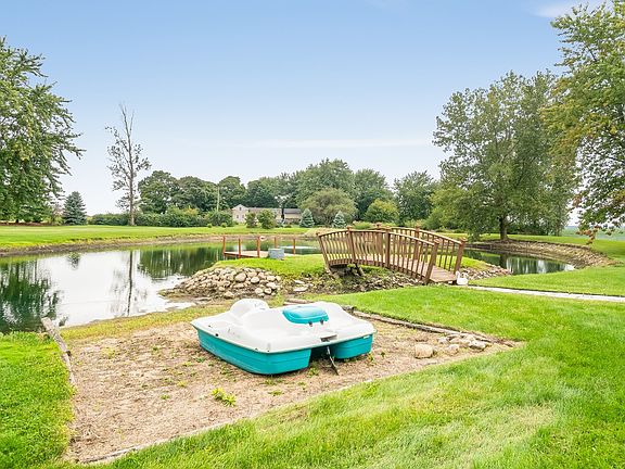 ~Pond is fully stocked with Catfish and Bluegill, Paddle Boat is also INCLUDED!